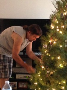 Dad decorating the tree